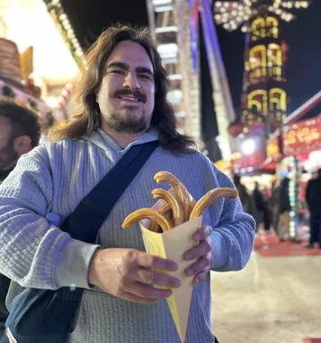 Dan in Paris with churros